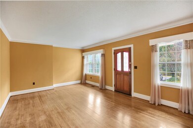 Large living room with hardwood floors.