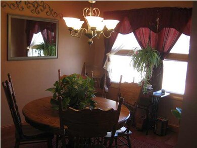 Dining area with back yard views