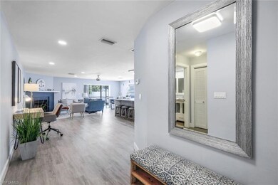 Home office featuring ceiling fan and hardwood / w