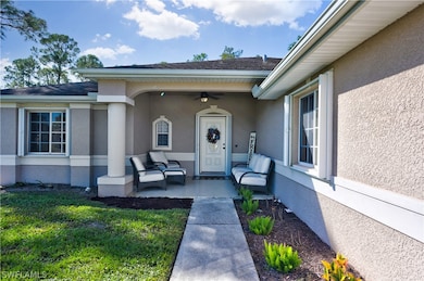 129 Greenbriar Blvd, Lehigh Acres, FL 33972 - photo 3