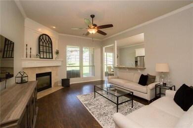 Fireplace mantel and woodwork recently painted. Ve