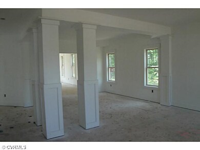 Dining Room - Formal columned dining room opens to