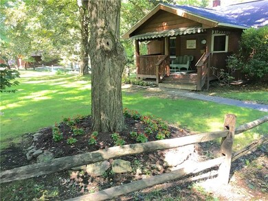 Beautiful landscaping touches and a great covered 