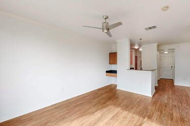 Unfurnished living room with a ceiling fan, light 
