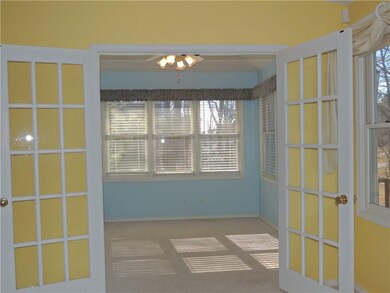 Sunroom off living room.