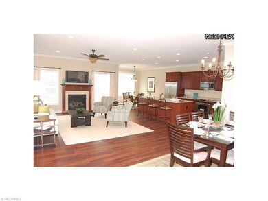 Great room with separate dining area opens to kitc