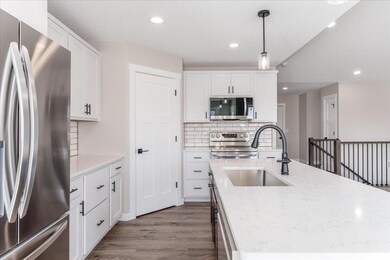 Plenty of cabinet space and a nice sized pantry!