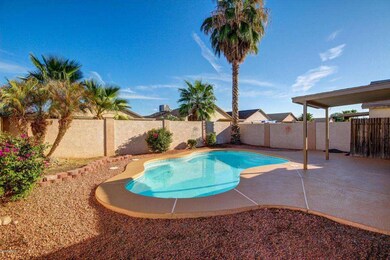Pool with extended cool decking side