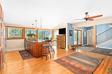 Kitchen featuring ceiling fan, a healthy amount of