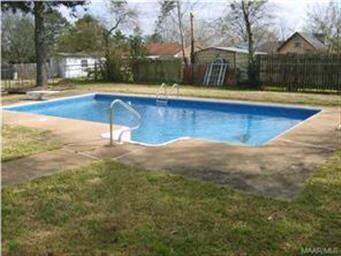 IN-GROUND POOL WILL MAKE THOSE HOT SUMMER DAYS TOL