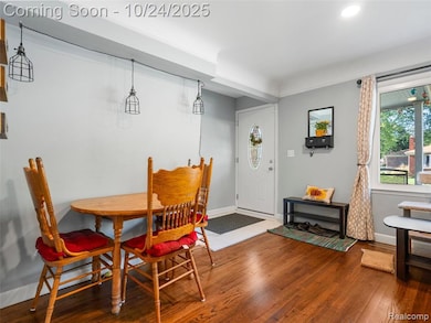 Dining space featuring dark wood-type flooring