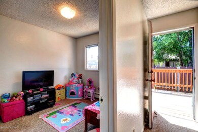 Bedroom #1 and back deck and fenced yard