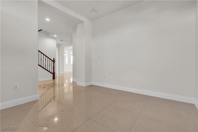 Empty room featuring recessed lighting, stairs, and light tile patterned floors