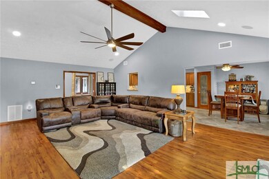 Living room with vaulted ceilings