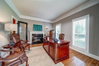 Main floor office with fireplace