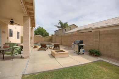 backyard grass & firpit