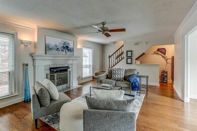 Large Den with custom built wet bar and fireplace 
