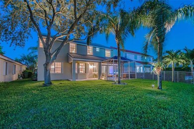 Enchanting backyard is dotted with shady trees upl