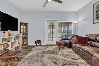 Living room featuring wood finished floors and a 