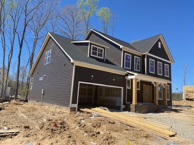 View of front facade featuring covered porch and a