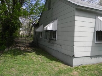 LEFT SIDE VIEW OF EXTERIOR.