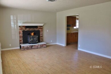 Ceramic tile Flooring, Wood Fireplace