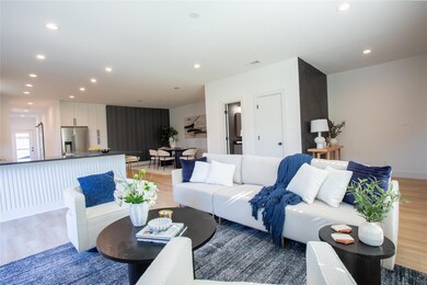 Living room featuring hardwood / wood-style floori