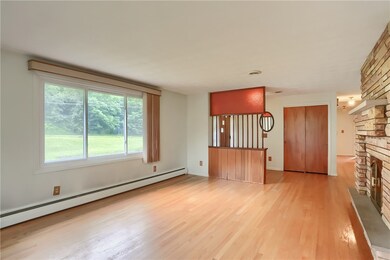 Luminous windows flood the space with natural light.