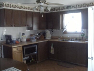 Kitchen. The eat-in kitchen has formica cabinetry 