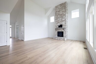 Another view of this gorgeous stone fireplace! Makes things cozy.