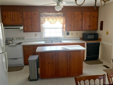 Kitchen with island and eat in dining area