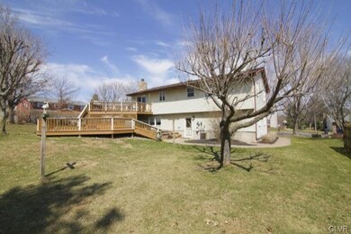 1/2 Acre lot    Double decks and paver walkways   