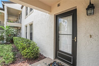 Doorway to property with visible vents, a balcony,