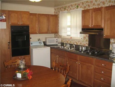 Kitchen - Updated cabinets, counter, oven