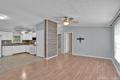 Unfurnished living room featuring light wood-type 