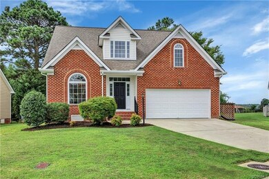 Welcome to this attractive Brick and Vinyl-clad ho