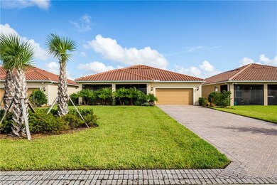 2 Car Garage in the back of home with landscaping 