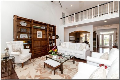 The two story great room is a visual delight.
