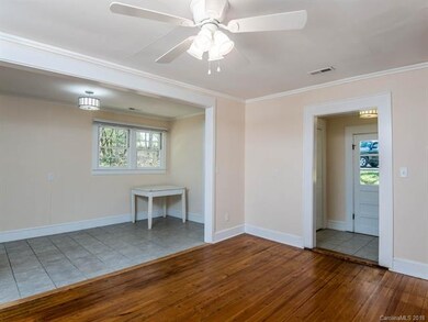 Hardwood floors shine in the entryway.