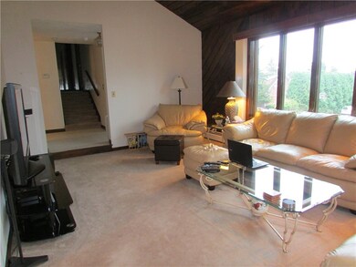 Open living room with Vaulted ceiling.