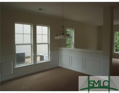 Dining Room. Formal dining room with wainscoting.