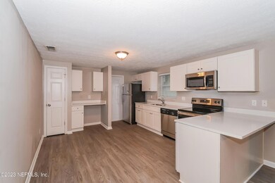 6968 Gribbin Ct, Jacksonville, FL 32210 - photo 7