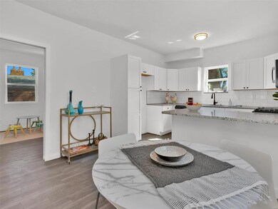 Lots of space for your family dinner table here!