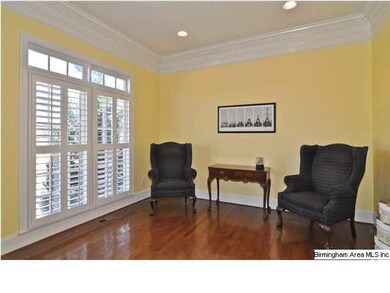 A dramatic two-story foyer greets your guests and 