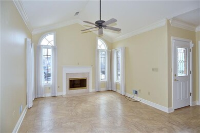 Living Room - Fresh neutral paint, crown molding, 