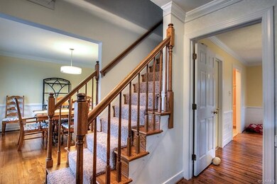 Foyer with new carpet on steps