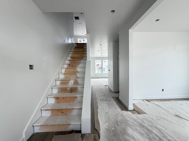 Stairway featuring baseboards