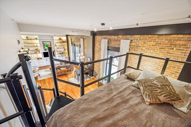 View from lofted bed to living area.