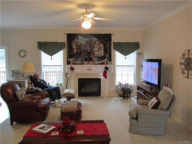 Open Family Room with Gas Fireplace. Hidden behind