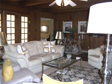 Double Doors off the charming Living Room with a n